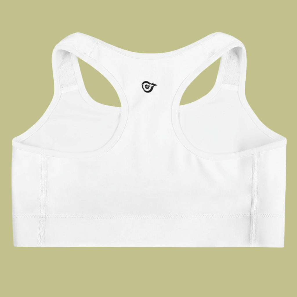 White sports bra with a logo on a beige background