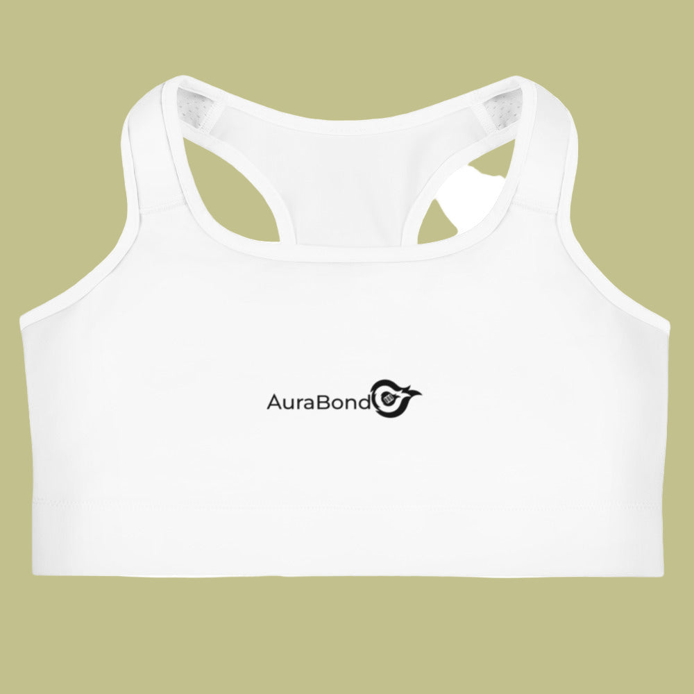 White sports bra with 'AuraBond' logo on a beige background
